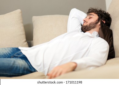 Handsome Man Sleeping On His Couch 