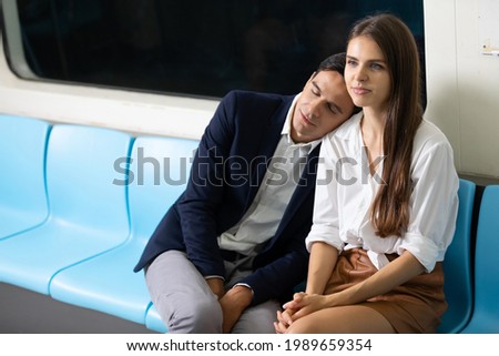 Similar – Image, Stock Photo Side view of loving couple looking at each other