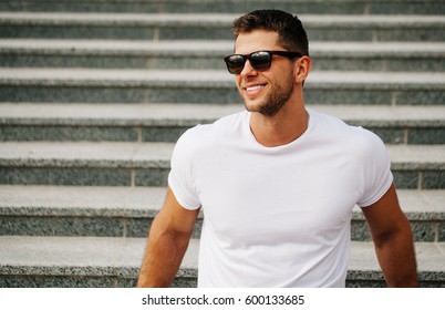Handsome man smiling with perfect teeth. Dental care  - Shutterstock ID 600133685