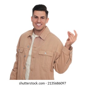 Handsome man snapping fingers on white background - Shutterstock ID 2135686097