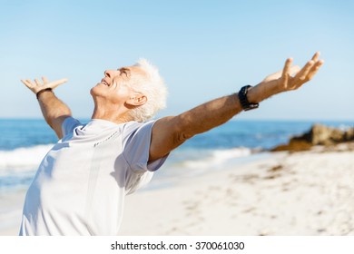 Handsome man in sport wear with outstretched arms - Powered by Shutterstock