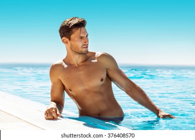 Handsome Man In Swimming Pool