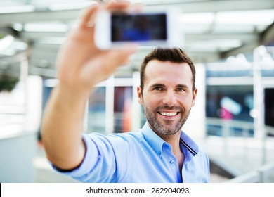 Handsome Man Taking Selfie Outside The Office