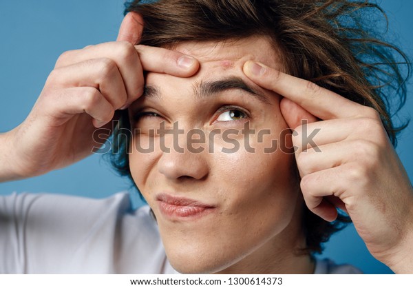 Handsome Man Tousled Hair Holds Hands Stock Photo Edit Now