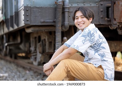 Handsome Man At Train Tracks, Mature Man Psychology
