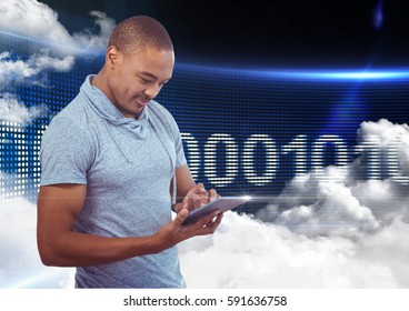 Handsome man using digital tablet against digitally generated background