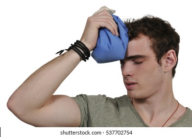 Handsome Man Using An Ice Pack For A Headache