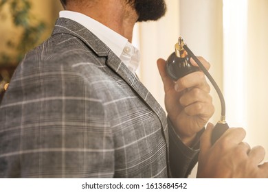 Handsome Man Is Using Vintage Atomizer Nozzle With Perfume