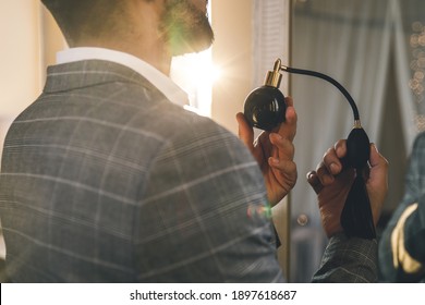 Handsome Man Is Using Vintage Atomizer Nozzle With Perfume