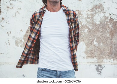 Handsome Man Wearing Blank Tshirt Posing Against Street Wall, Front T Shirt Mock Up On Model, Fashion Urban Style