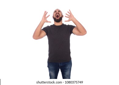 Handsome Man Wearing A Casual Outfit, He Is In Pain, Screaming Out Load, Isolated On White Background.