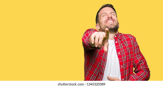 Handsome man wearing casual shirt Laughing of you, pointing to the camera with finger hand over chest, shame expression - Shutterstock ID 1345320389