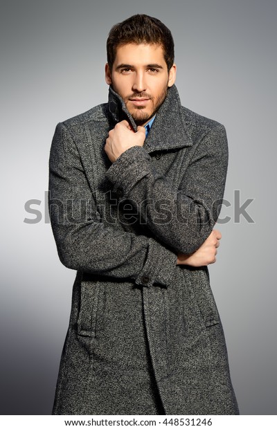 Handsome Man Wearing Coat Posing Studio Stock Photo (Edit Now) 448531246
