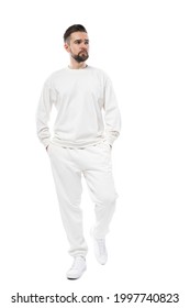 Handsome Man Wearing White Long-sleeved T-shirt And Pants Isolated On White Background