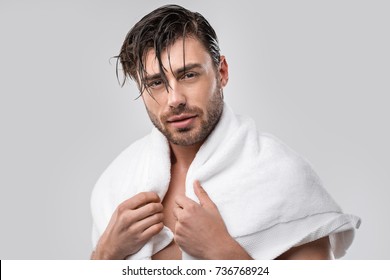 Handsome Man With Wet Hair And Towel, Isolated On Grey