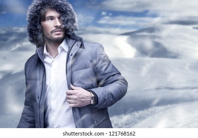 Handsome Man In Winter Snow