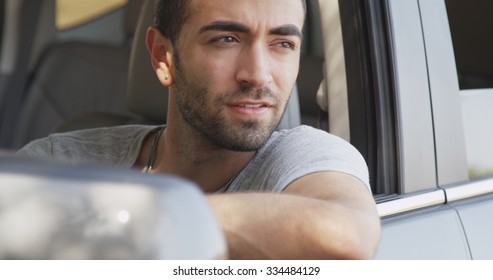 Handsome Mexican Man Getting Into His Car