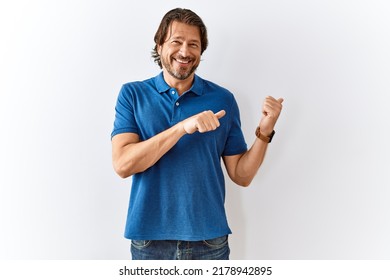 Handsome Middle Age Man Standing Together Over Isolated Background Pointing To The Back Behind With Hand And Thumbs Up, Smiling Confident 