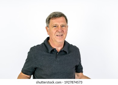 Handsome middle age man studio portrait with white background