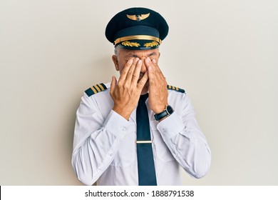 Handsome Middle Age Mature Man Wearing Airplane Pilot Uniform Rubbing Eyes For Fatigue And Headache, Sleepy And Tired Expression. Vision Problem 