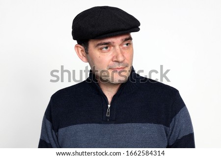 Handsome middle aged man posing in studio. Style, elegance, business, fashion concept.