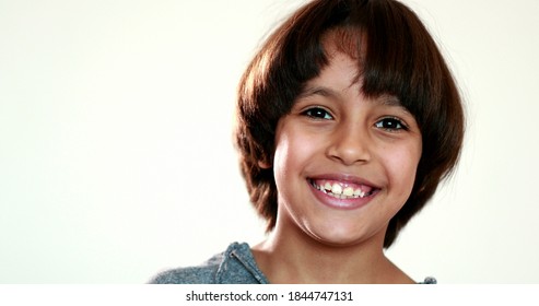 Handsome mixed race kid portrait close-up.