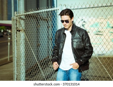 Handsome model in leather jacket. 