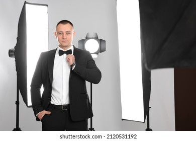 Handsome Model Posing In Studio. Professional Photo Session