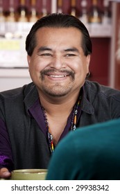 Handsome Native American Man With Friend In A Restaurant