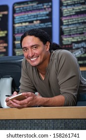 Handsome Native American Restaurant Owner At Counter