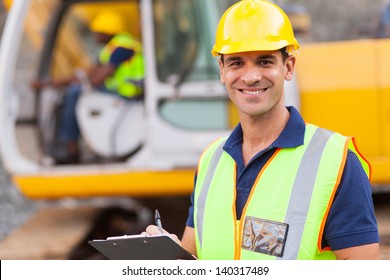 Handsome Road Construction Supervisor With Clipboard