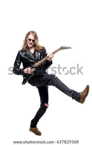 handsome rocker in sunglasses posing playing electric guitar isolated on white, rock star guitar concept