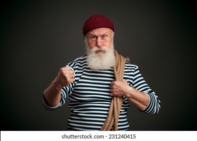Handsome sailor isolated on black background. Seaman.