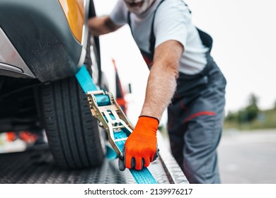 Handsome Senior Man Working In Towing Service On The Road. Roadside Assistance Concept.