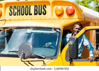 Handsome Senior School Bus Driver Looking At Camera