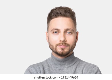 Handsome Serious Young Man Portrait. Close-up Of Male Face. Men Model With Beard And Modern Haircut. People, Lifestyle, Male Beauty, City Life Concept