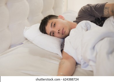 The Handsome Sexual Man On A Bed