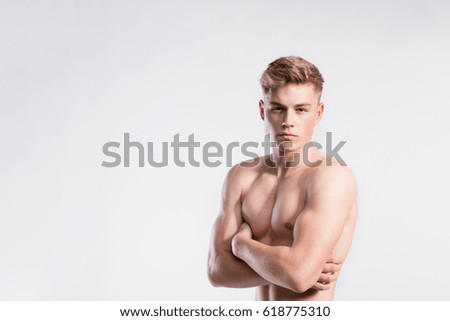 Similar – Image, Stock Photo young man shirtless studio shot portrait