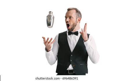 Handsome Shoked Bartender Looking At Flying Shaker Isolated On White