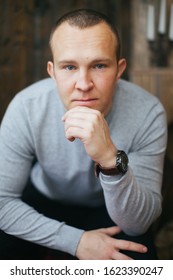 A Handsome Slavic Man.Portrait Of A Brutal Man. A Bald Man Looks At The Camera.
