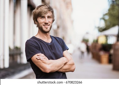 Handsome Smiling Young Man Portrait. Cheerful Men Looking At Camera