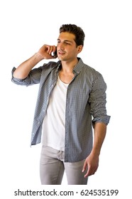 Handsome Smiling Young Man Talking On Cell Phone, Isolated On White Background In Studio Shot. Looking To A Side