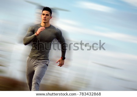 Similar – Image, Stock Photo Young man stretching in the city after jogging