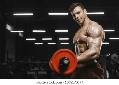 Handsome Strong Athletic Men Pumping Muscles Stock Photo (edit Now 