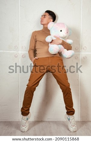 Similar – Image, Stock Photo cute girl near pink wall holding toy