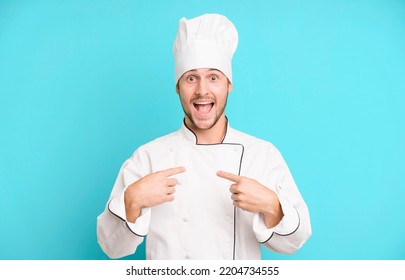 Handsome Teenager Feeling Happy And Pointing To Self With An Excited. Chef Concept