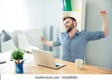 Handsome Tired Man Streching After Long Working Day