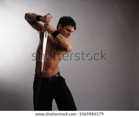 The handsome warrior prepares for battle.