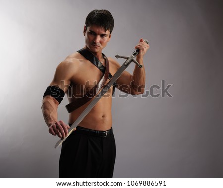 The handsome warrior prepares for battle.