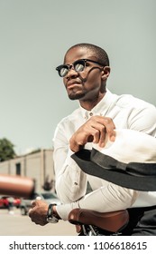 Handsome Young African American Man In Sunglasses Leaning On City Bike